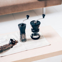 Hario Mini Mill Plus beside Hario Skerton Plus