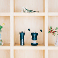 Hario Mini Mill Plus with Skerton Plus on shelf