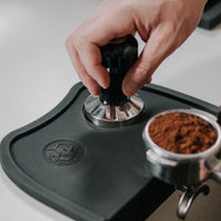 Rhino Tamp Mat with Tamper action shot