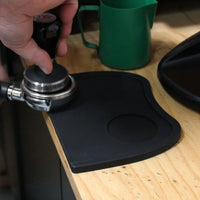 Rhino Tampo Mat action shot with tamper